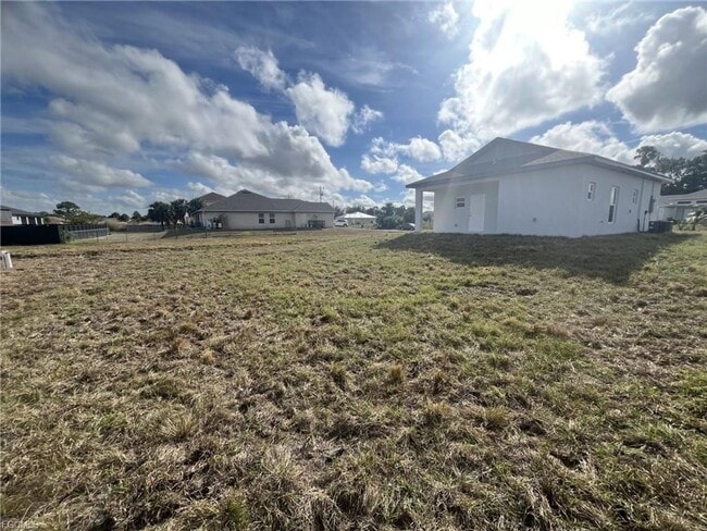 Building Photo - Brand new 2/1 -LARGE BACK YARD- LEHIGH ACRES