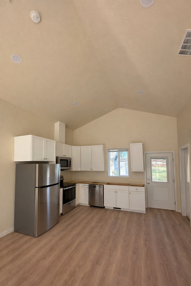 Building Photo - Bright & New 2 Bed / 2 Bath with Vaulted Ceilings & Covered Parking!