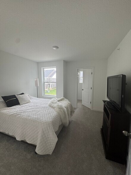 Second bedroom with walk in closet - 21998 Harvest Ave