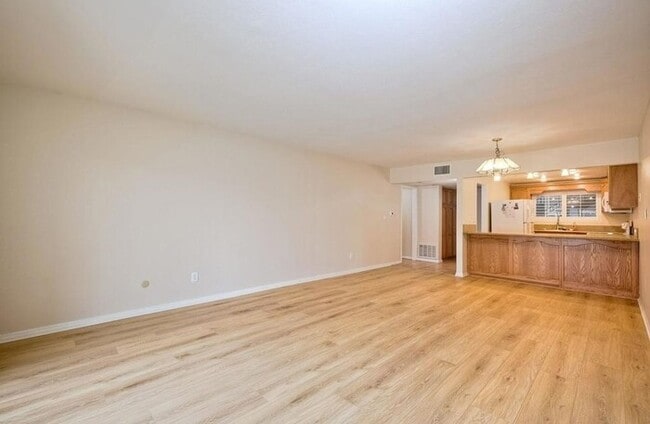 Building Photo - First-Floor 2BR Condo with Pool Access & Covered Parking in La Bonita