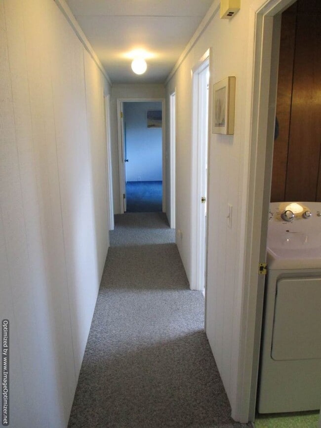 Building Photo - Charming Partially Furnished Waterfront Ho...