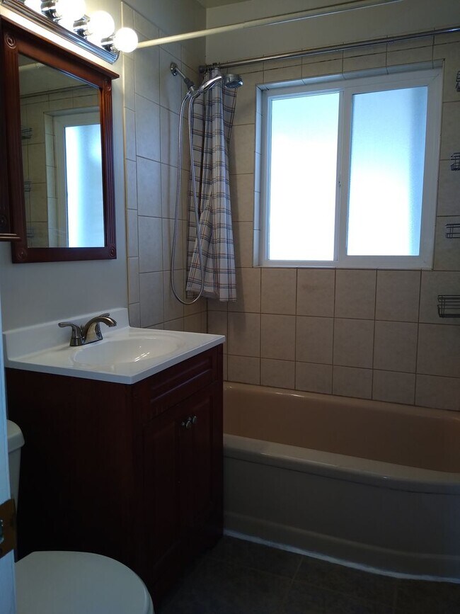 Building Photo - University Hills  Adorable 2 Bed 1 Bath Home with HUGE Fenced Yard, Central Air/Heat, Garage and ...
