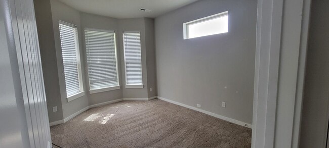 Building Photo - "Luxury Living: Stunning End Unit Townhome...