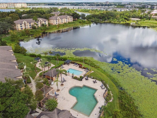 Building Photo - Seurat Street, Orlando, FL 32819 - 4 BR 2 BA condo
