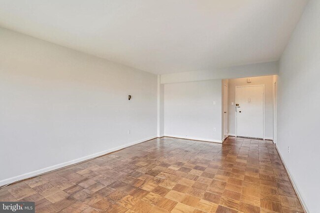 Building Photo - Welcome to The Towers!! This gem of a studio is nestled in a quiet neighborhood in Wesley Heights.