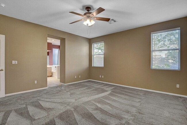 Building Photo - Gorgeous NW Single Story! 3 Car Garage! Serene Backyard.