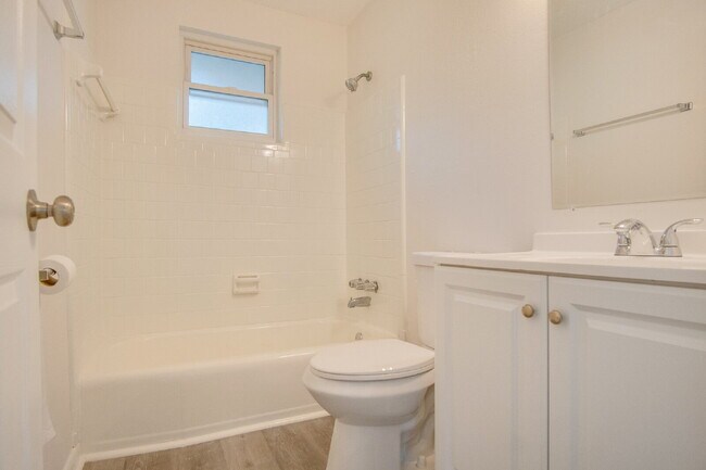 Building Photo - Stunning 4BR/2BA Pensacola Home with Private Pool, Modern Kitchen, Luxury Vinyl Flooring, Fully F...