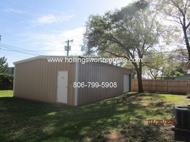 Building Photo - 4 bedroom, 2 bath, 2 car garage with shop ...