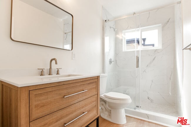 Building Photo - 8440 Willoughby Ave