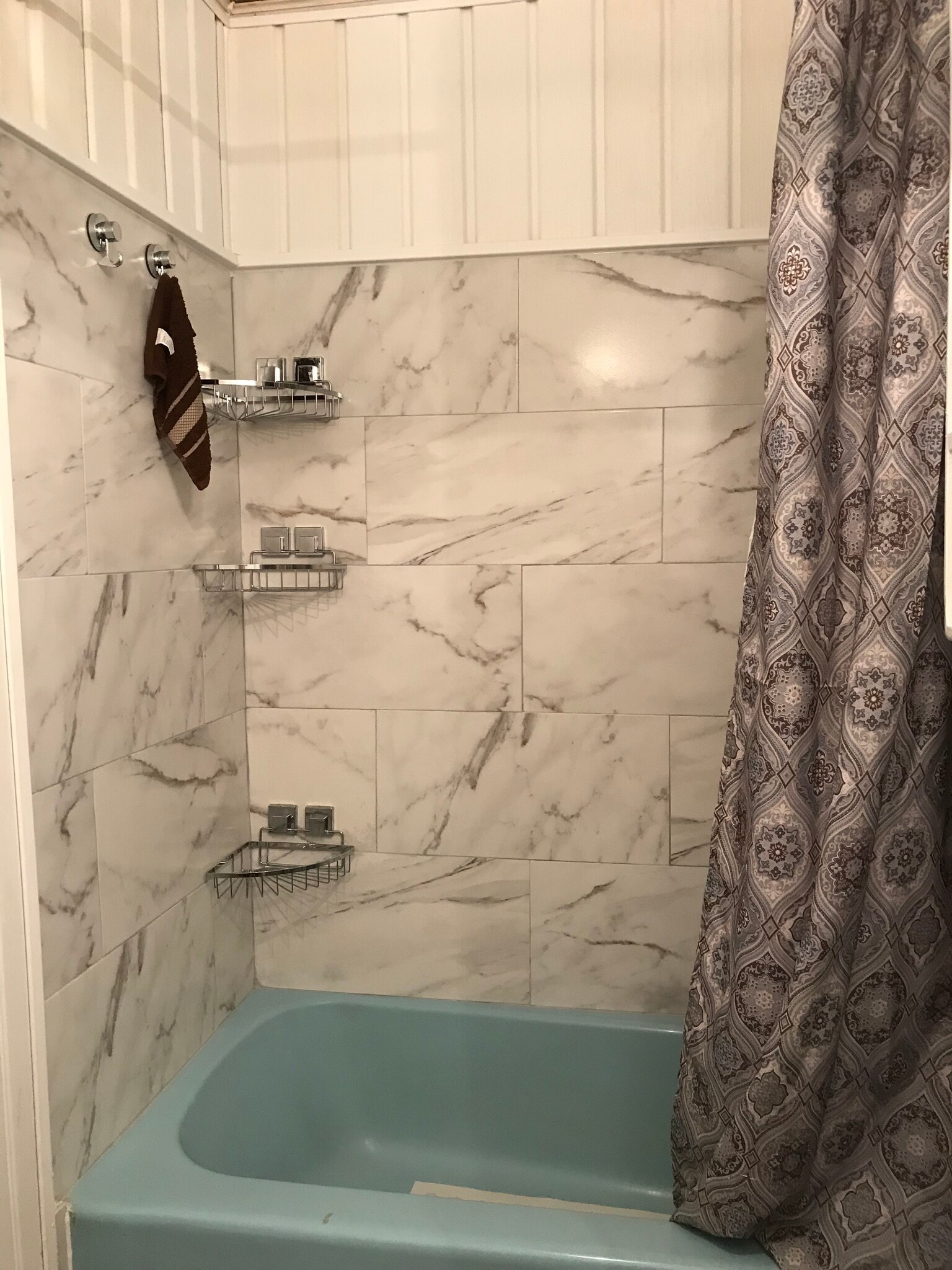 SS baskets & hooks for additional shampoo, conditioner, and body wash storage - 1407 W Church St