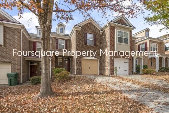 Building Photo - Charming Townhome with Open Layout, Back Patio & One-Car Garage – Near RTP, RDU & Everyday Conven...