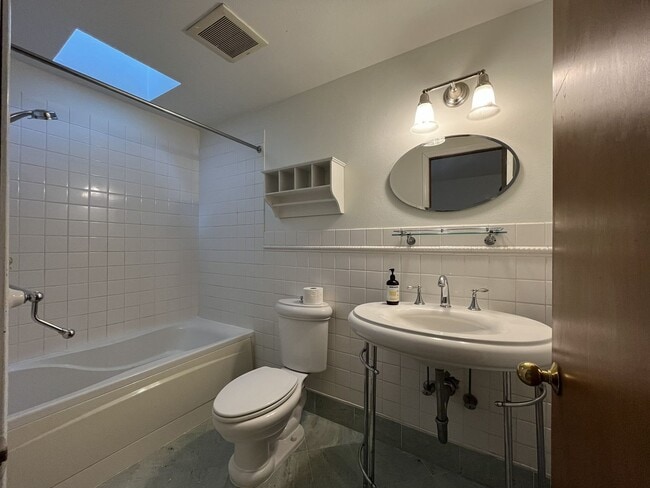 Building Photo - Spacious 3-Bedroom Home with Custom Stone Fireplace, Attached 2-Car Garage & Expansive Backyard i...