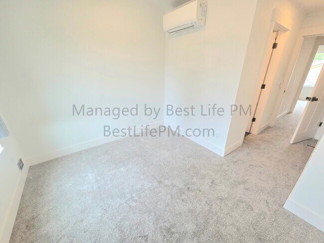Building Photo - 310 NE 58th Ave