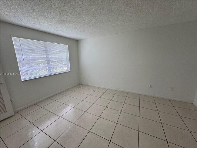Building Photo - 4440 NW 79th Ave