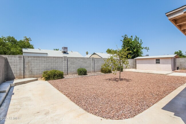 Building Photo - 6410 W Sandra Terrace