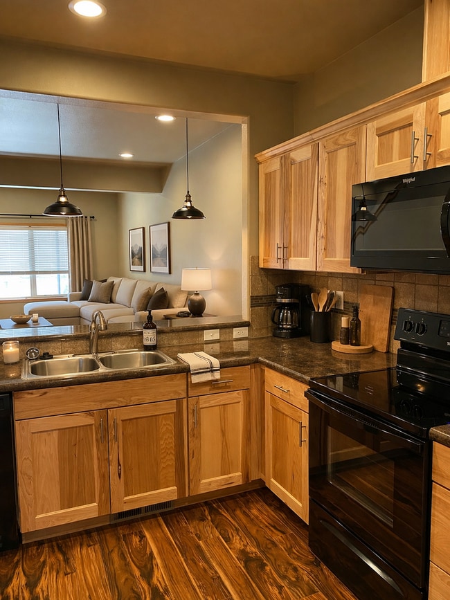 Building Photo - Beautiful Open-Concept Townhome with Washer & Dryer, Carport & $$$$ Move-In Credit
