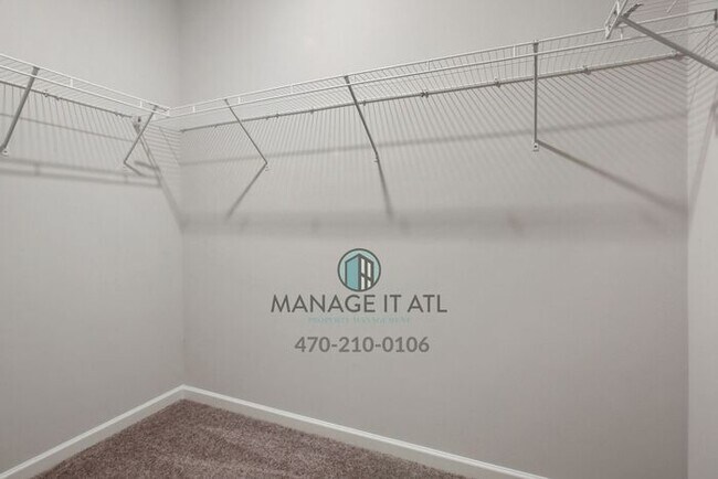 Building Photo - Modern 3-level Townhome featuring 4 bedrooms and 3 1/2 baths