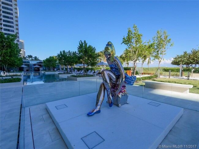 Building Photo - 10201 Collins Ave