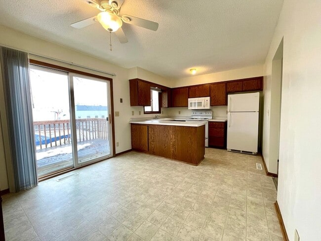 Building Photo - 6166 Upper 51st St N