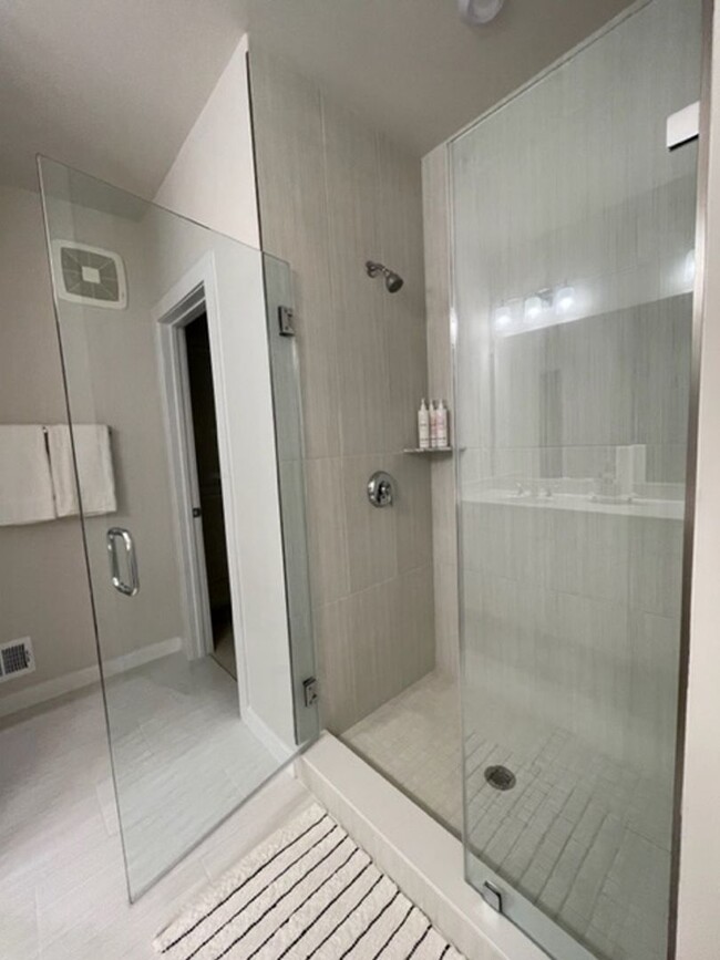 Building Photo - Modern 3BR Condo: Walk to Metro, 3 Miles f...