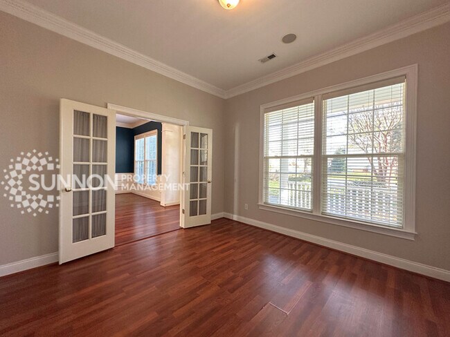 Building Photo - Wooded, Charming 3 Bedroom with Tons of Space