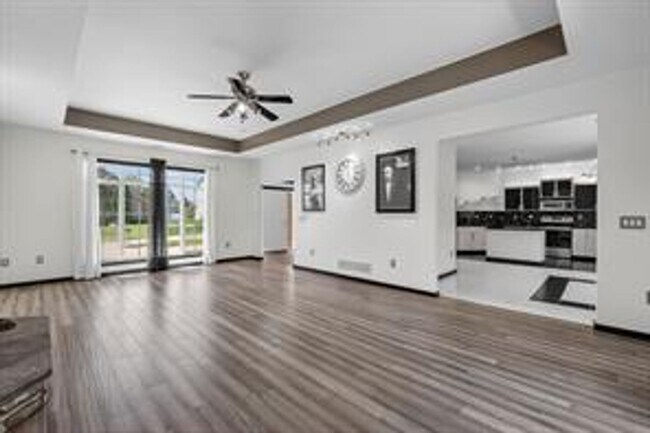 Building Photo - Spacious 5-Bed Walkout Home with Over 3,50...