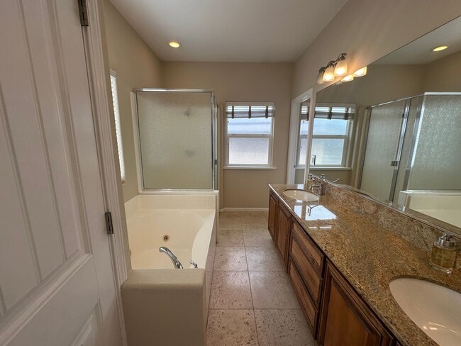 Building Photo - Home located in a gated Lakefront community with 3 swim areas & a boat dock