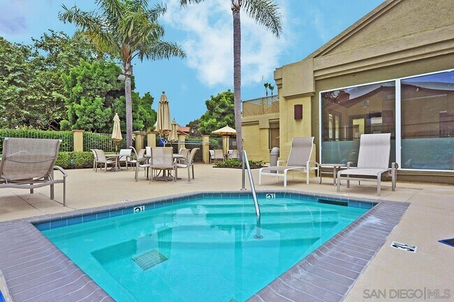 Building Photo - 7565 Charmant Dr