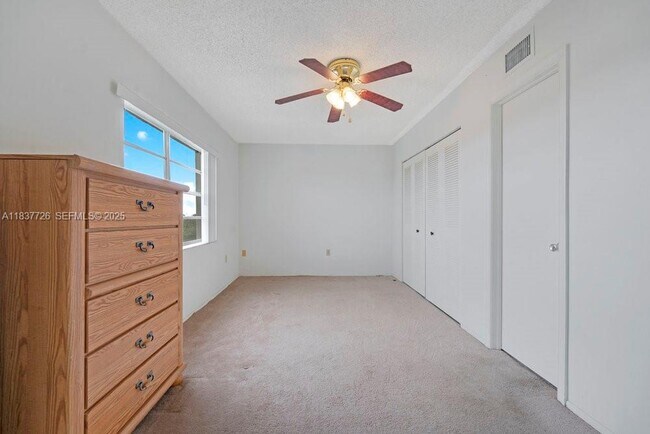 Building Photo - 2998 Sunrise Lakes Dr E