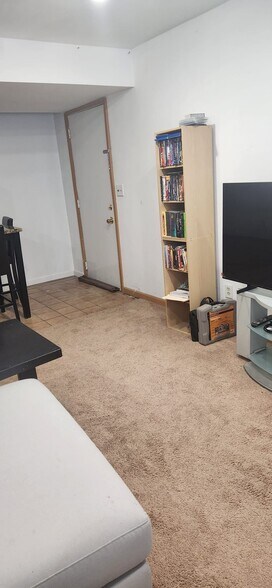 View#16 of downstairs livingroom and garage door - 2116 Thaler Ave