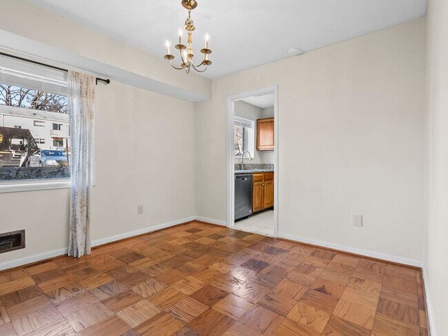 Building Photo - Commuter’s Dream! Large 2BR/2BA Condo Steps from Metro – All Utilities Included!