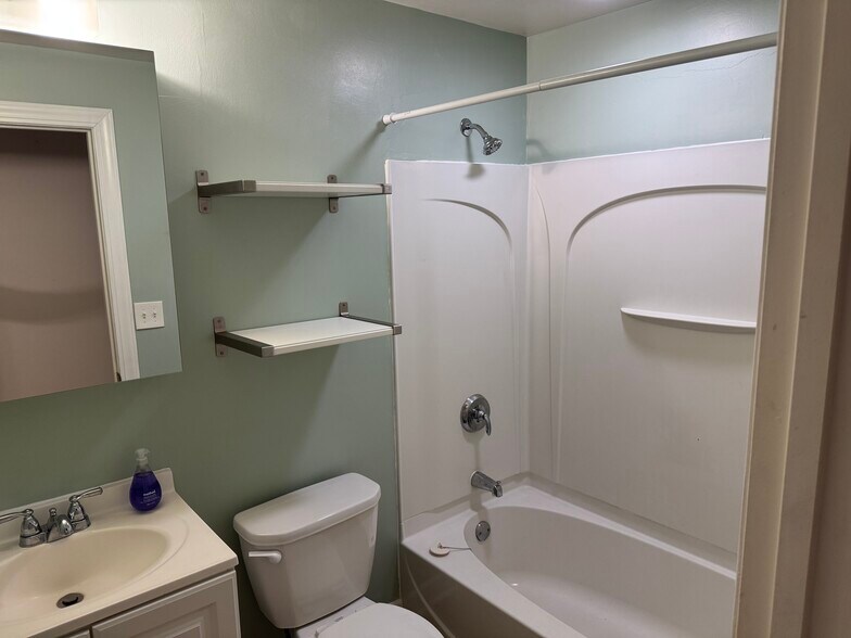 Updated bathroom with built in shelves - 1369 Saint Clair Ave