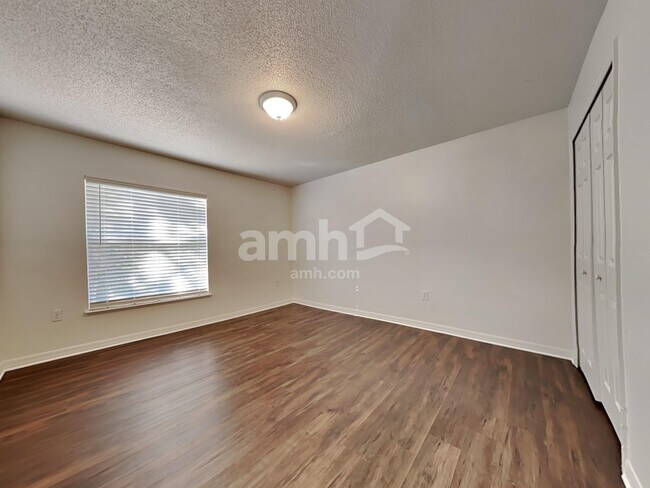 Building Photo - 6686 Gentle Oaks Dr E