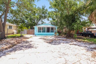Building Photo - 3 BR/1.5BA | Newly Renovated Single Family Home |  Tropical Landscaping | In St Peterburg!