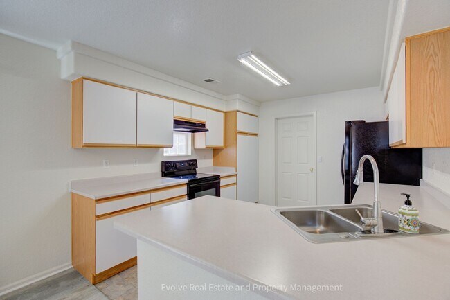 Building Photo - Evolve Real Estate: Bright & Spacious Home in Denver’s Green Valley Ranch! Available May 1st