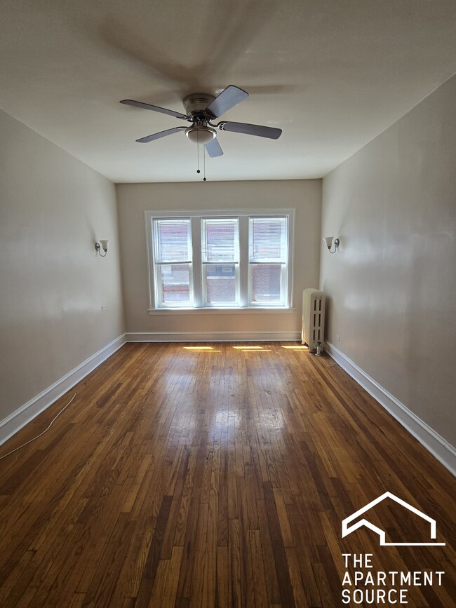 Building Photo - 1366 W Estes Ave