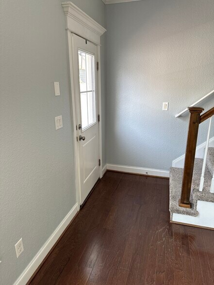 View to back door and to stairs. - 611 Veery St