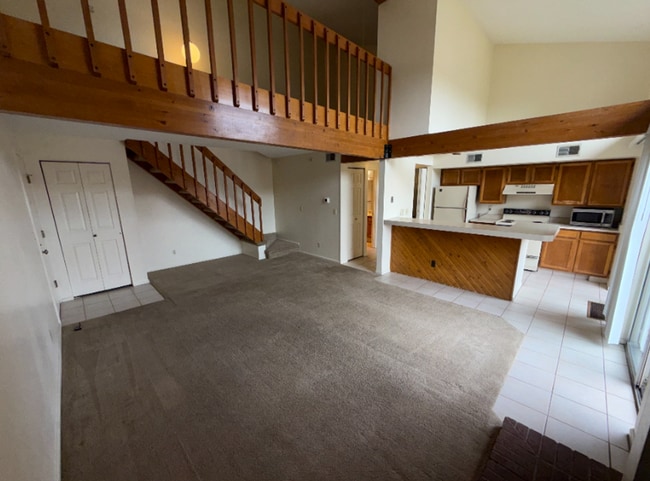 Building Photo - Spacious with sky light and loft!