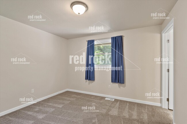 Building Photo - 2211 E 49th Ave