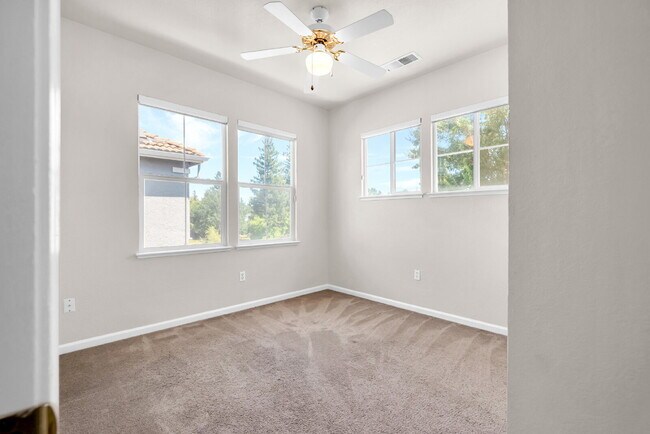Building Photo - Move-In Ready 4-Bed, 3-Bath Gem in a Covet...