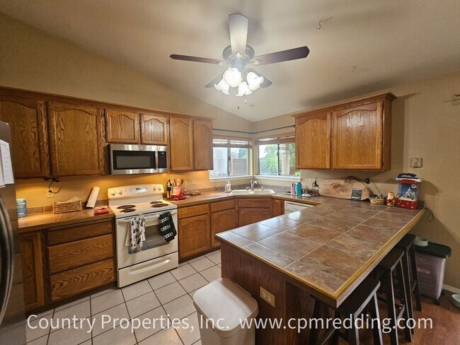 Building Photo - Spacious 4-Bedroom Home in Mary Lake Neighborhood Available January 15th!