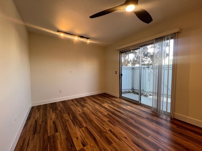 Building Photo - TWO PARKING SPACES INCLUDED! In Unit Washer & Dryer! Large Private Patio for Bikes, Boards and Bb...