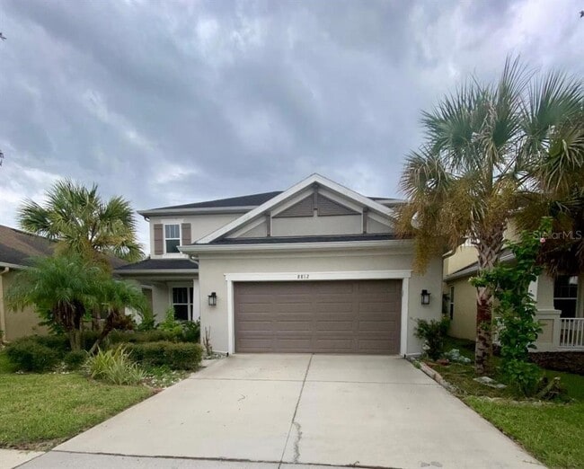 Building Photo - 8812 Tropical Palm Dr