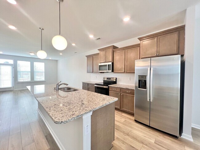 Building Photo - Stunning 4BD, 3.5BA Knightdale Townhome with a 2-Car Garage in an HOA Community