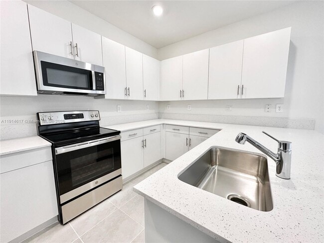 Building Photo - 11423 West 33rd Ct