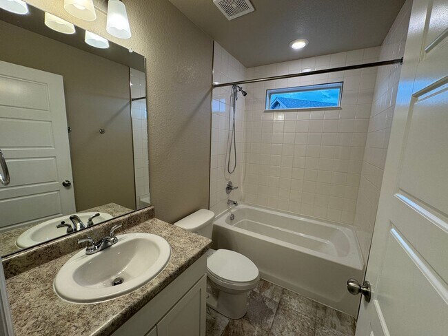 Building Photo - Modern 3-Story Corner Lot Home with Hot Tu...