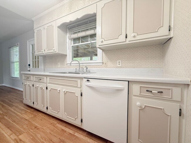 Building Photo - Spacious 3-Bedroom Home with Screened Porch, 2-Car Garage + Workshop