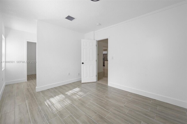 Building Photo - 9312 NW 3rd Ave