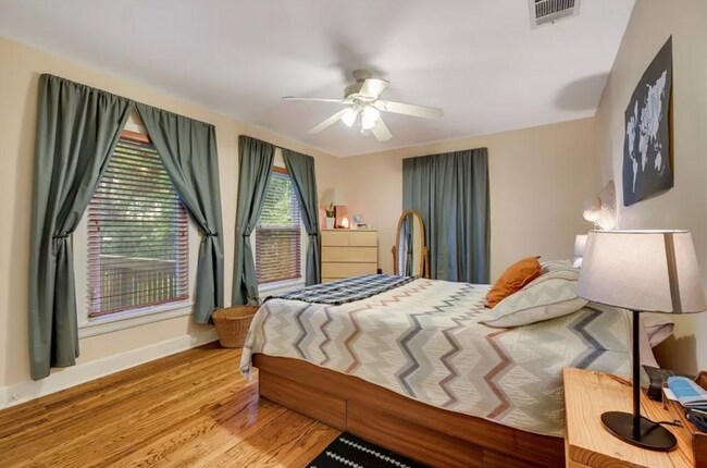 Building Photo - Discover Your Austin Oasis: Revitalized Bungalow with Hardwood Floors and Entertainer's Deck!