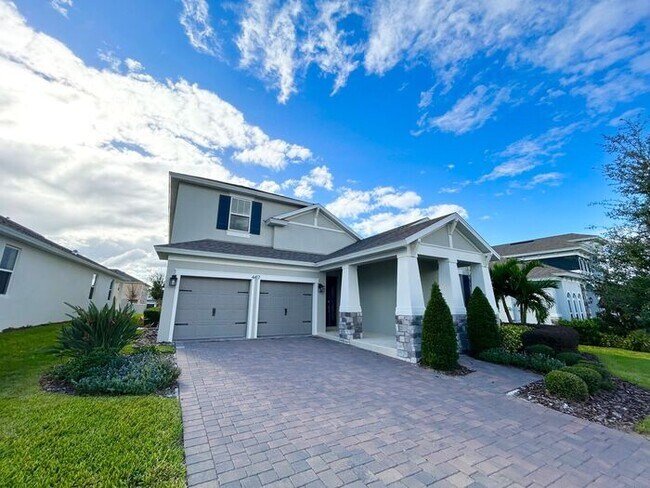 Building Photo - "Unfurnished" Luxurious 5/3.5 Stunning Home with a Generous Loft and a 2 Car Garage in the Highly...